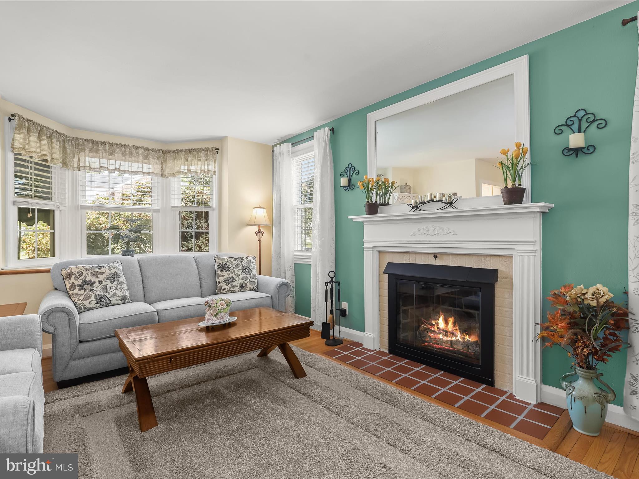 411 Greenlow Road Baltimore, MD 21228 - Photo 10 of 59 Fireplace - Hardwood Floors - Bay Window
