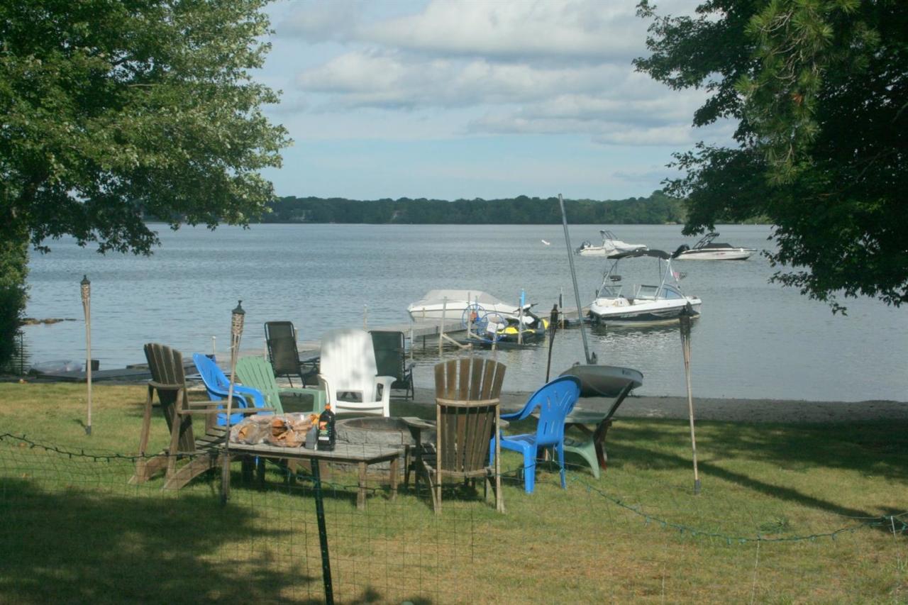164 Annable Point Road Centerville, MA 02632 - Photo 4 of 13 a view of a lake with outdoor seating