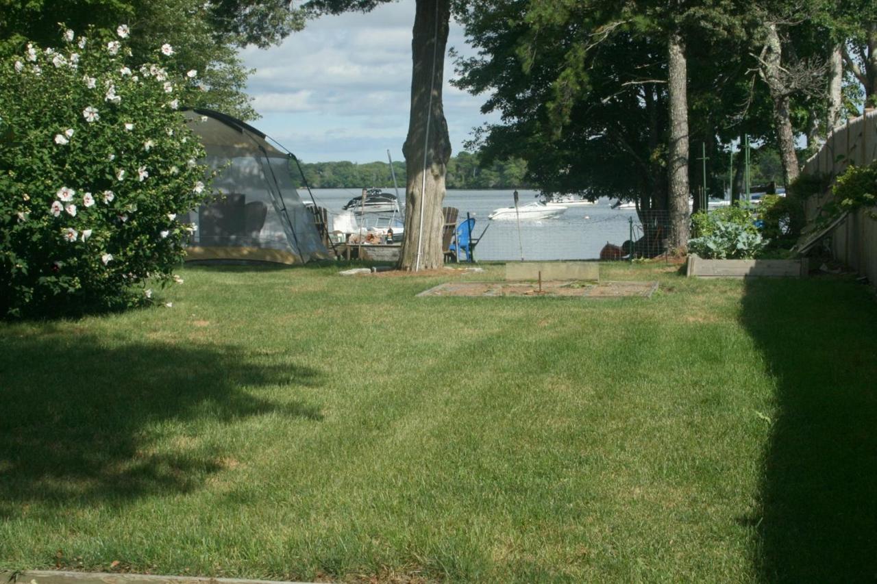 164 Annable Point Road Centerville, MA 02632 - Photo 6 of 13 a view of a back yard