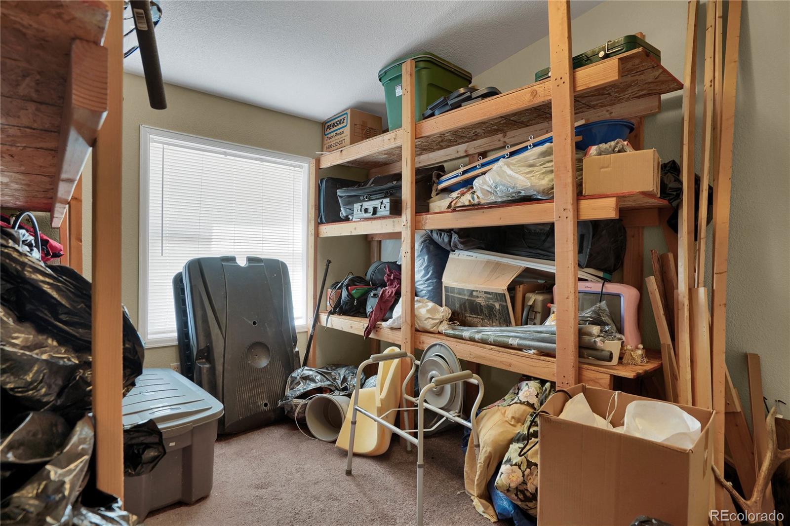 15840 South Lauppe Road Yoder, CO 80864 - Photo 21 of 22 a view of a room with gym equipment