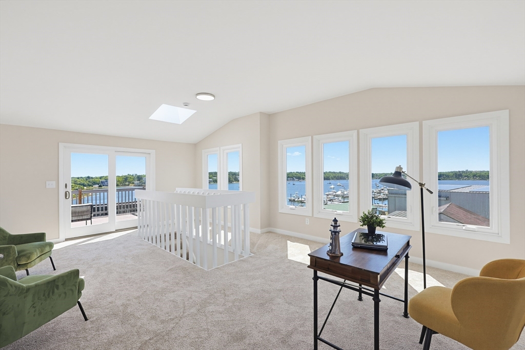 45 Main Street, Unit 35 Wareham, MA 02571 - Photo 23 of 34 a living room with furniture and a large window