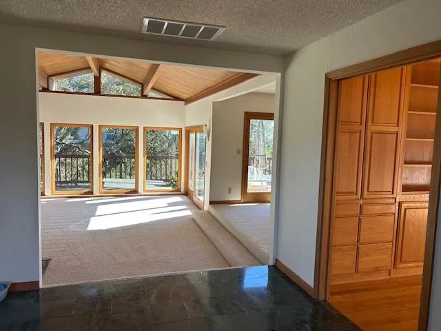 an entryway at livingroom with furniture and wooden floor