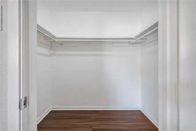a view of an empty walk in closet