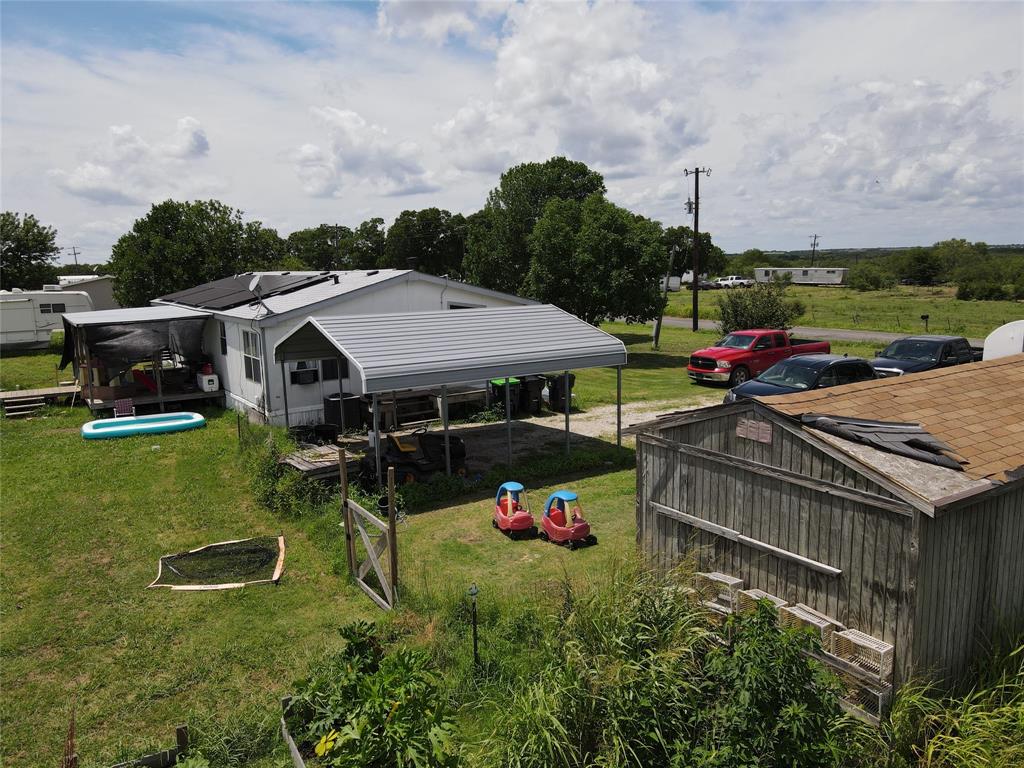15962 Fritcher Road Pilot Point, TX 76258 - Photo 12 of 24 an aerial view of a house with pool fire pit and outdoor seating
