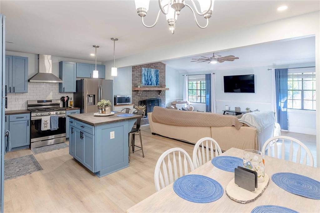 6375 Caladium Drive Acworth, GA 30102 - Photo 18 of 41 a large kitchen with cabinets and a stove