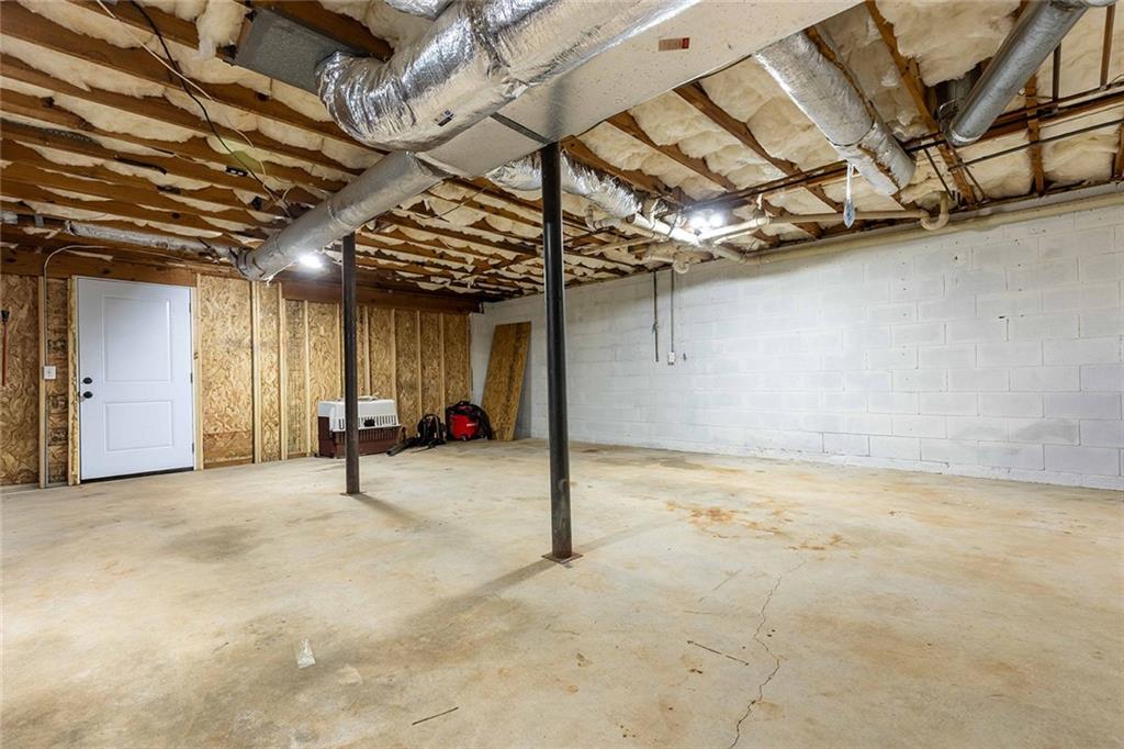 6375 Caladium Drive Acworth, GA 30102 - Photo 34 of 41 a view of a room with wooden walls