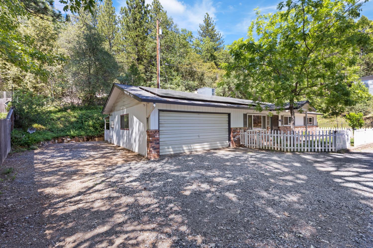 2971 Letitia Avenue Placerville, CA 95667 - Photo 18 of 65 a view of a house with a yard and large tree