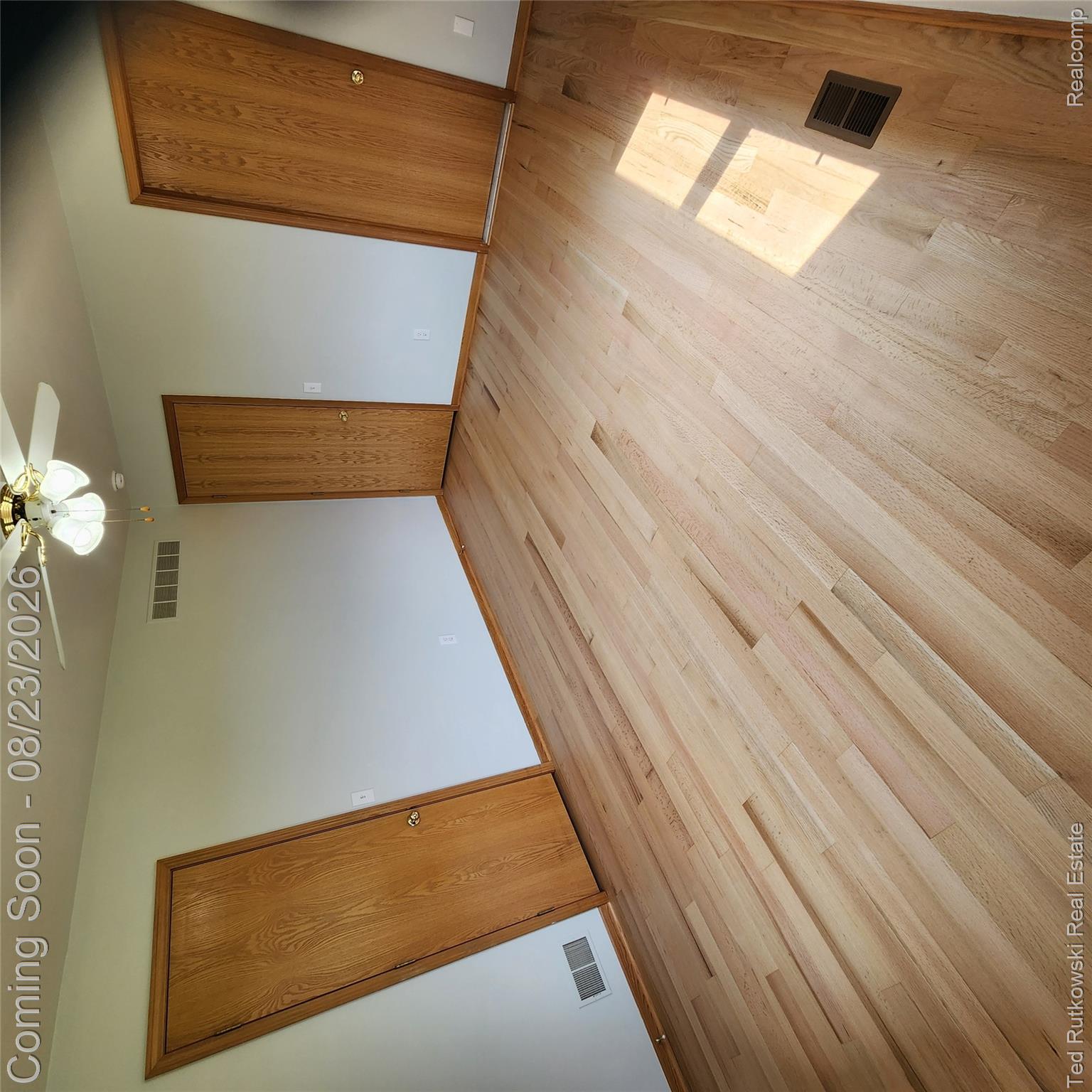 12350 Masters Road Memphis, MI 48041 - Photo 25 of 45 Light White Oak -finish flooring and three wood-finish doors