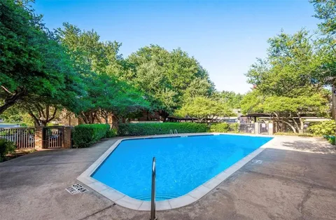 a view of a back yard with green space