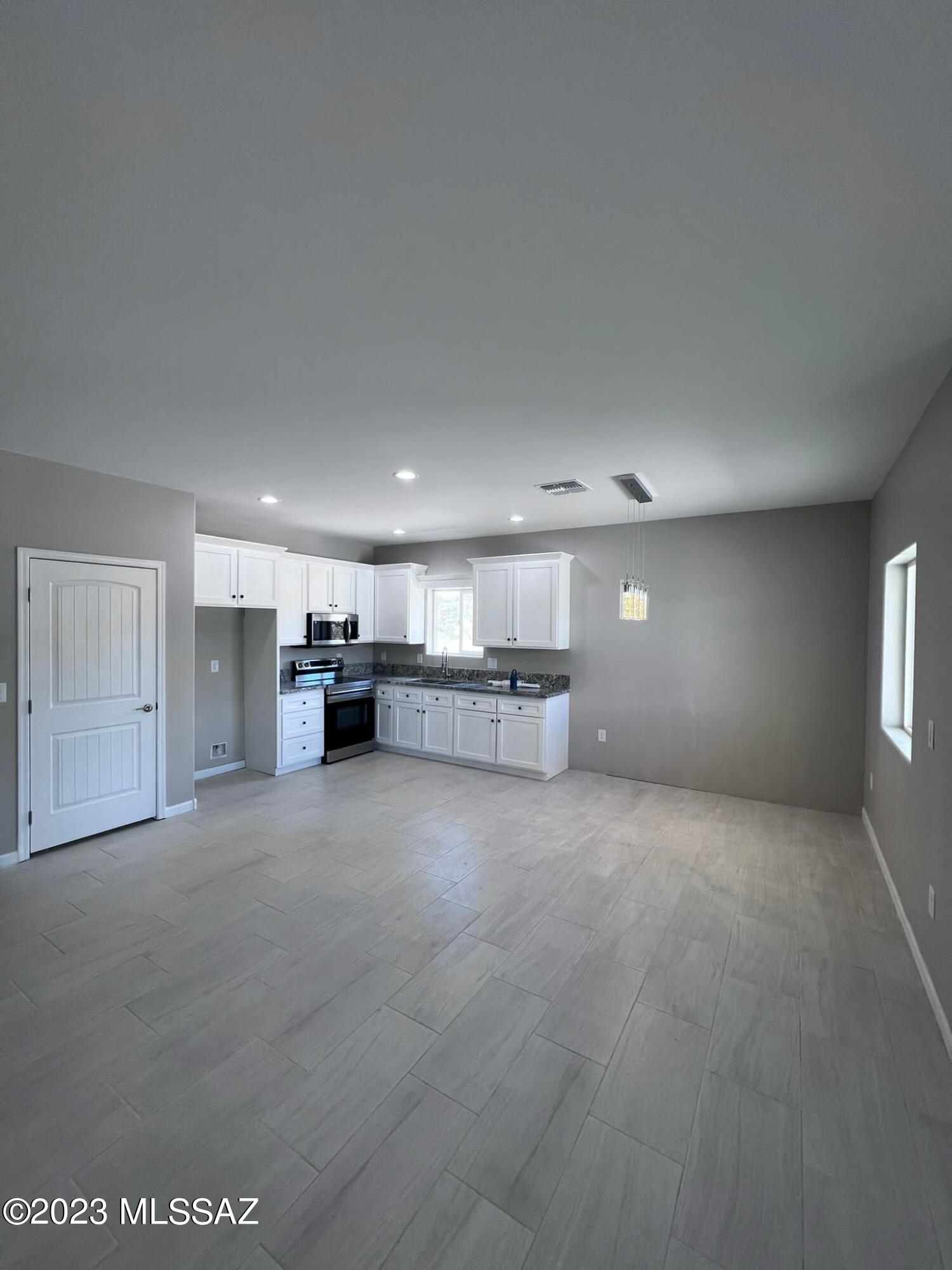 1792 Portugal Court Rio Rico, AZ 85648 - Photo 4 of 14 a view of kitchen and a window