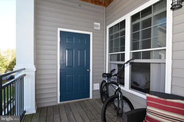 a view of front door and deck
