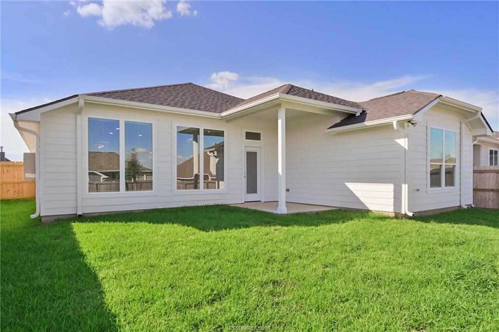 3124 Tarleton Court Bryan, TX 77808 - Photo 20 of 22 a front view of a house with a yard and garage