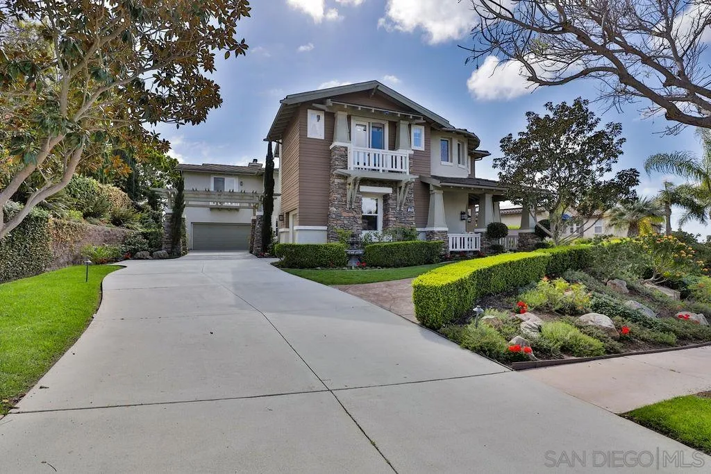 1375 Ravean Court Encinitas, CA 92024 - Photo 12 of 73 a front view of a house with garden