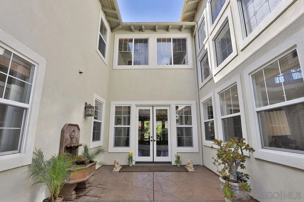 1375 Ravean Court Encinitas, CA 92024 - Photo 17 of 73 a front view of a multi story building