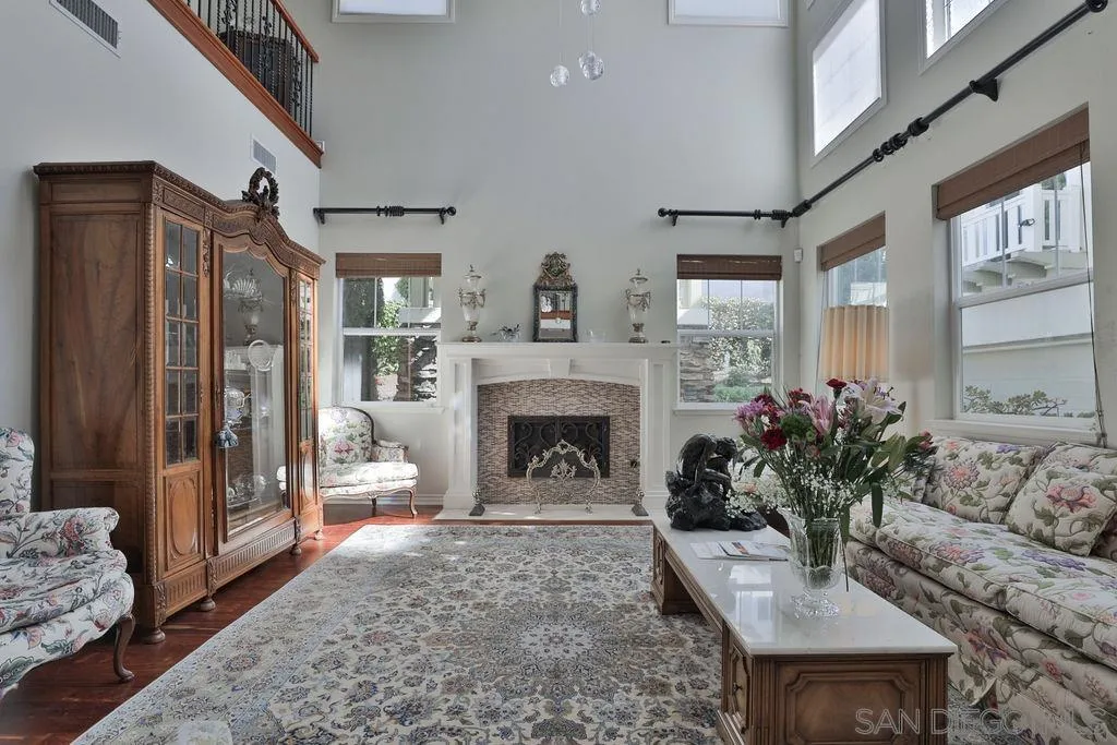 1375 Ravean Court Encinitas, CA 92024 - Photo 25 of 73 a living room with furniture and a fireplace
