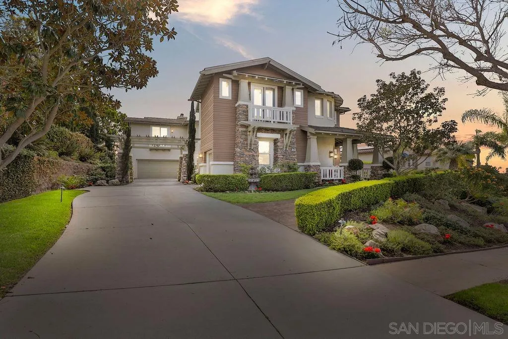 1375 Ravean Court Encinitas, CA 92024 - Photo 4 of 73 a front view of a house with a garden and yard