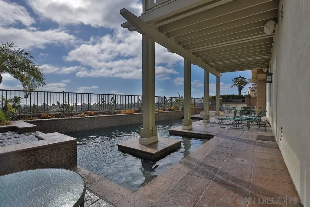 1375 Ravean Court Encinitas, CA 92024 - Photo 43 of 73 a view of a patio with couches table and chairs