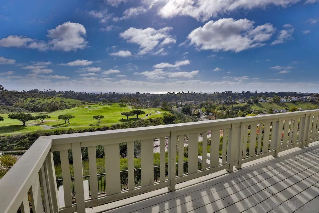 1375 Ravean Court Encinitas, CA 92024 - Photo 59 of 73 a view of city and mountain from a balcony