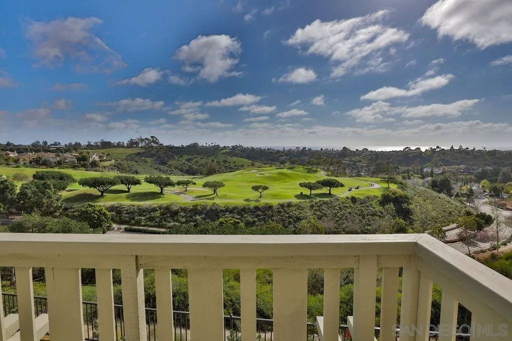 1375 Ravean Court Encinitas, CA 92024 - Photo 60 of 73 a view of a green field with lots of trees in the background