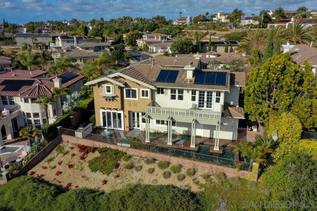 1375 Ravean Court Encinitas, CA 92024 - Photo 69 of 73 an aerial view of a residential apartment building with a yard