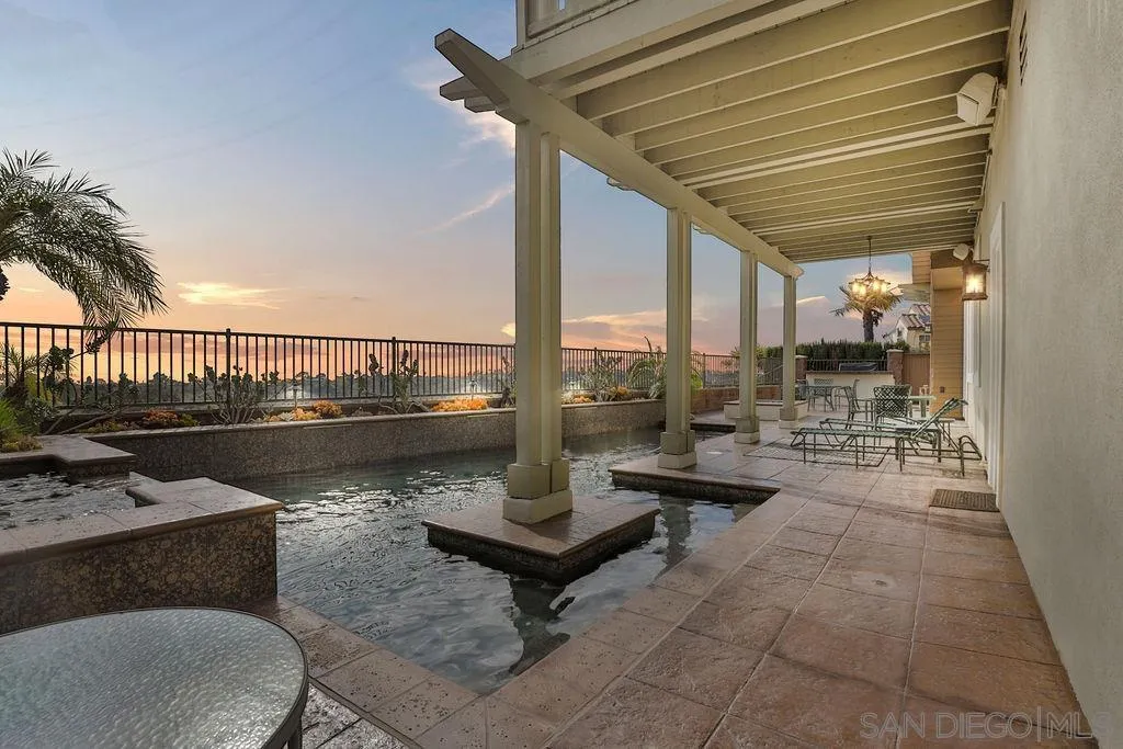 1375 Ravean Court Encinitas, CA 92024 - Photo 7 of 73 a building outdoor space with patio furniture and a potted plant