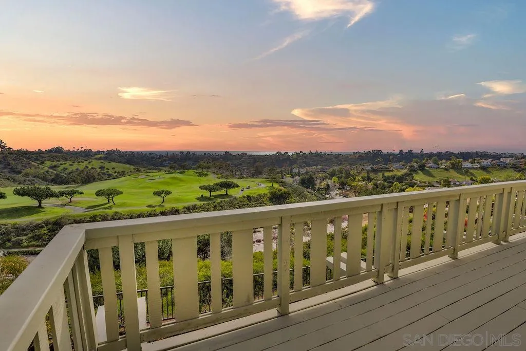 1375 Ravean Court Encinitas, CA 92024 - Photo 9 of 73 a view of city and mountain from a balcony