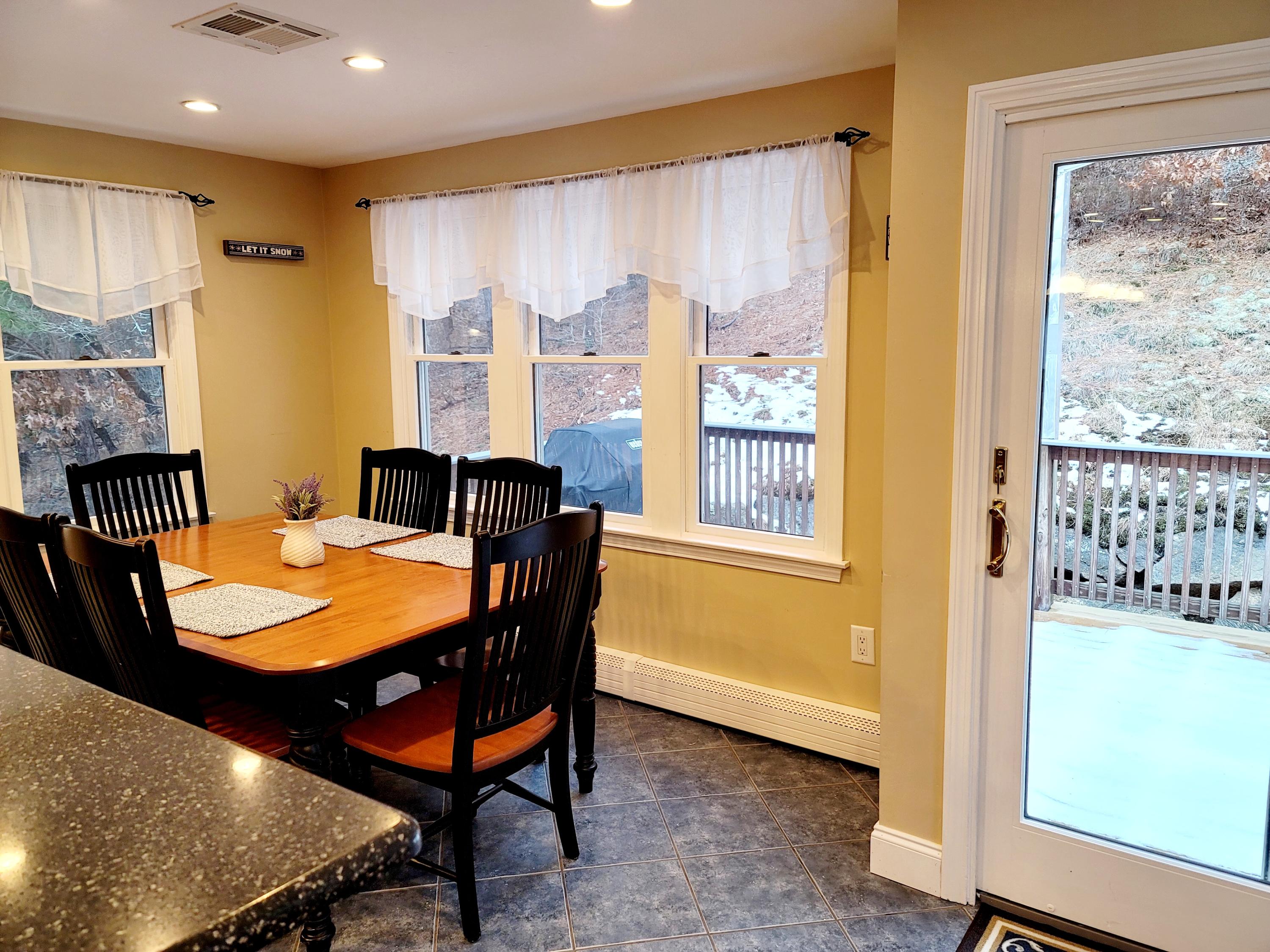 101 Valley Bars Road Monument Beach, MA 02532 - Photo 12 of 34 Dining Area Overlooking Rear Deck