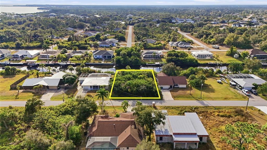 12309 Mitchell Terrace Port Charlotte, FL 33981 - Photo 1 of 6 an aerial view of residential houses with city view