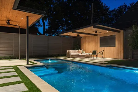 a front view of house with small garden