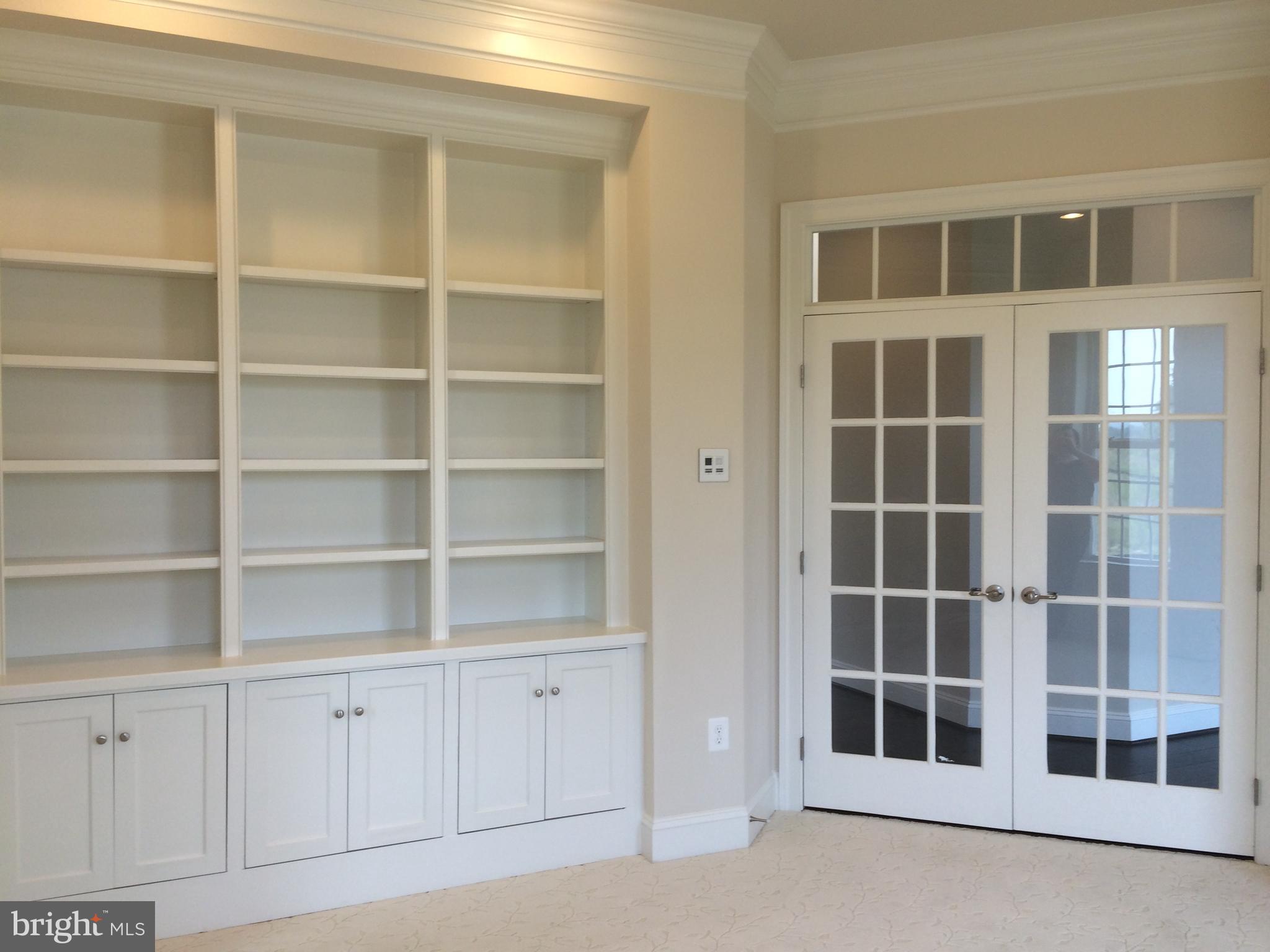515 Parkland Road Eldersburg, MD 21784 - Photo 11 of 18 a view of an empty room with empty shelves