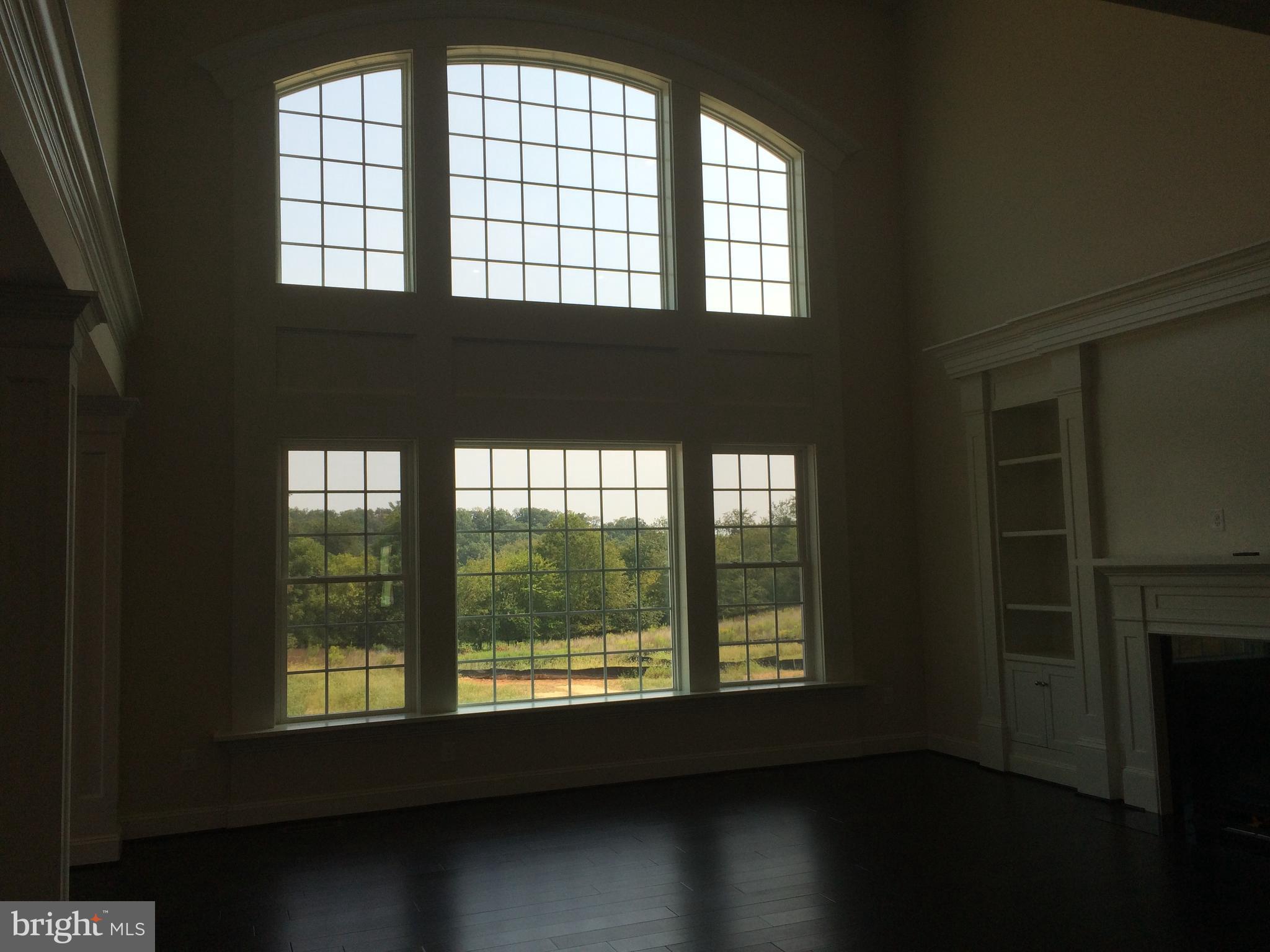 515 Parkland Road Eldersburg, MD 21784 - Photo 5 of 18 a living room with a large window