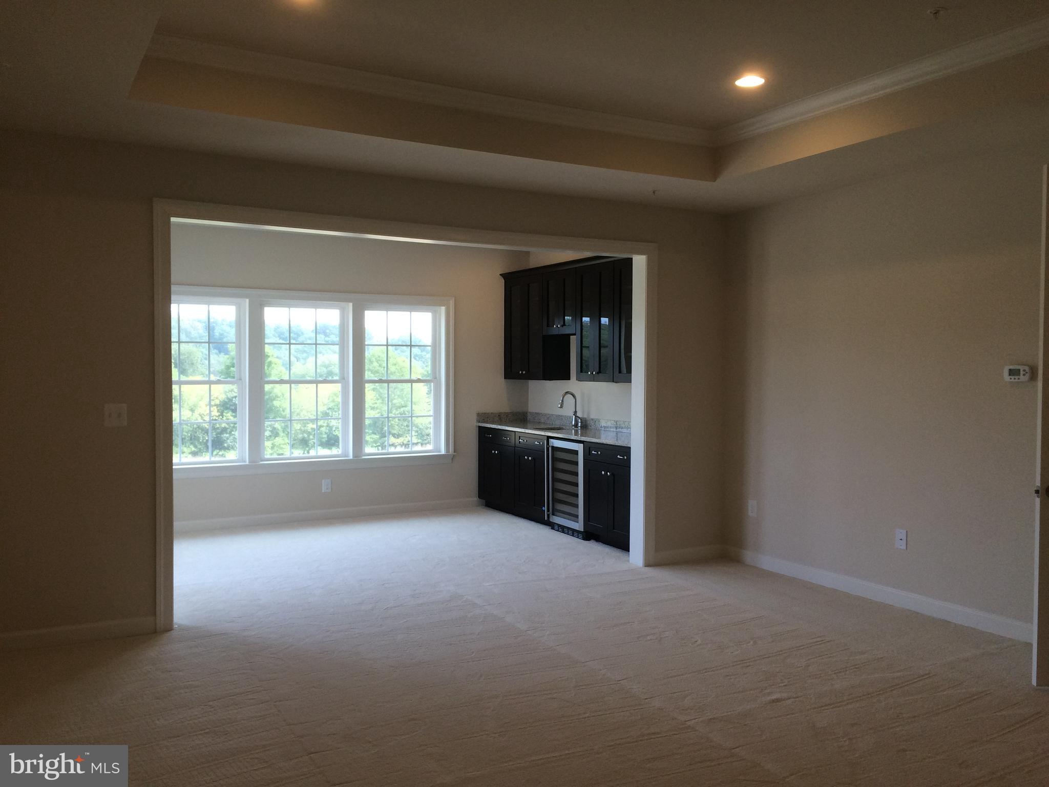 515 Parkland Road Eldersburg, MD 21784 - Photo 7 of 18 a view of a kitchen with a sink and dishwasher kitchen view