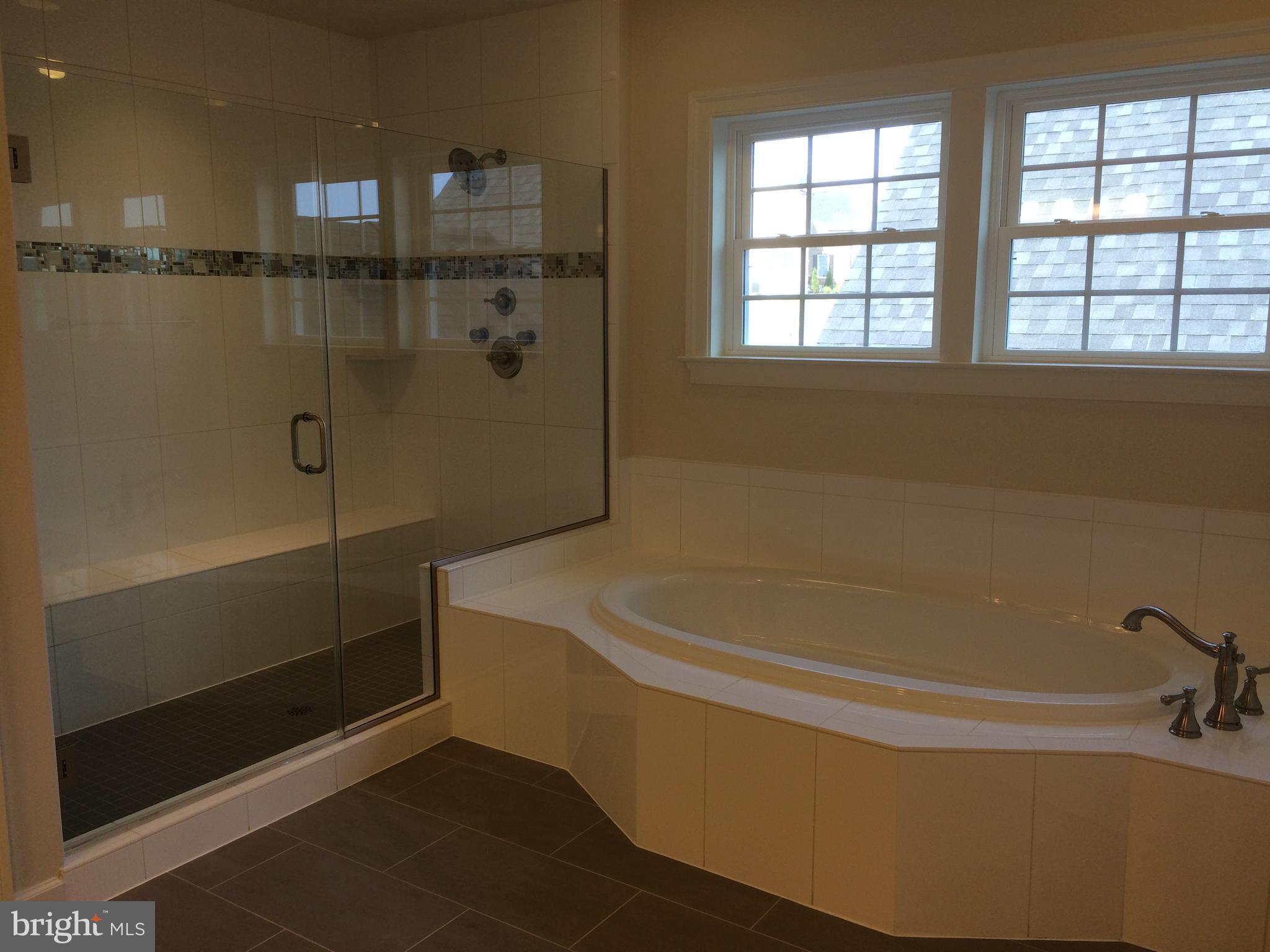 515 Parkland Road Eldersburg, MD 21784 - Photo 10 of 18 a bathroom with a bathtub