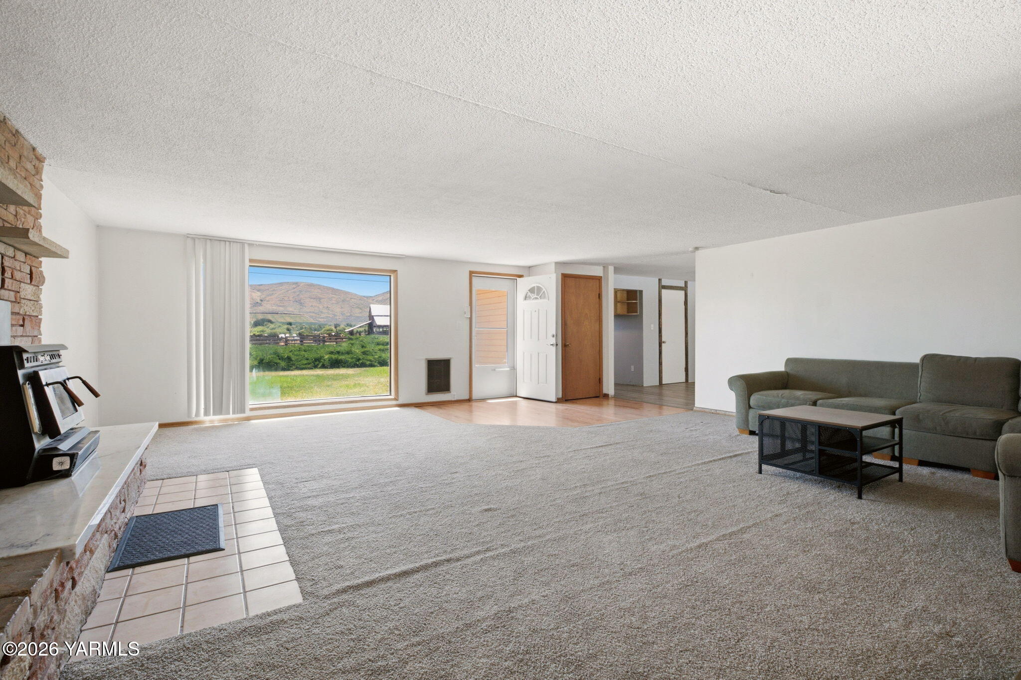 15791 Rutherford Road Yakima, WA 98903 - Photo 12 of 31 Living Room with Wood Stove