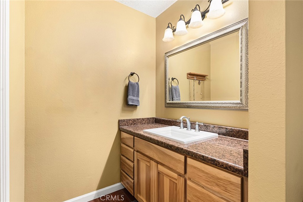 3985 Front Street Chico, CA 95928 - Photo 22 of 55 a bathroom with a sink and a mirror