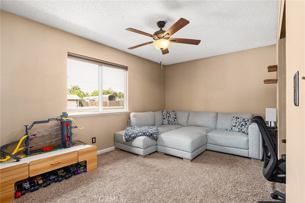 3985 Front Street Chico, CA 95928 - Photo 24 of 55 a living room with furniture and a window