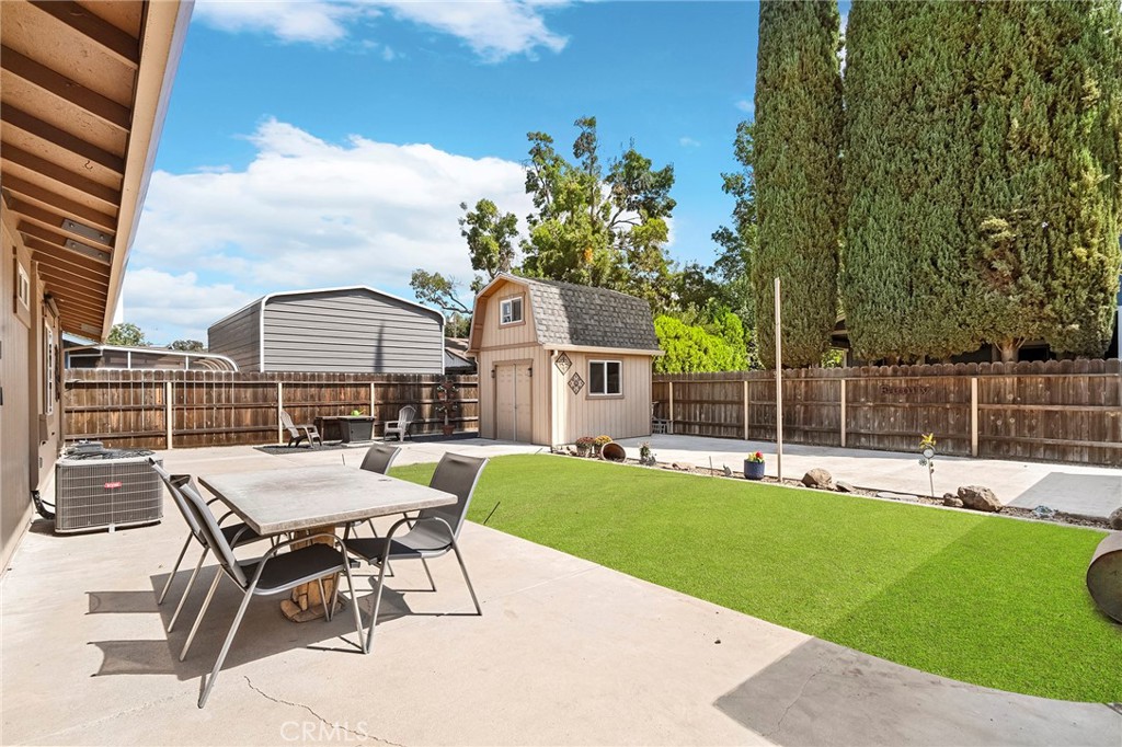 3985 Front Street Chico, CA 95928 - Photo 35 of 55 a view of a house with a backyard porch and sitting area