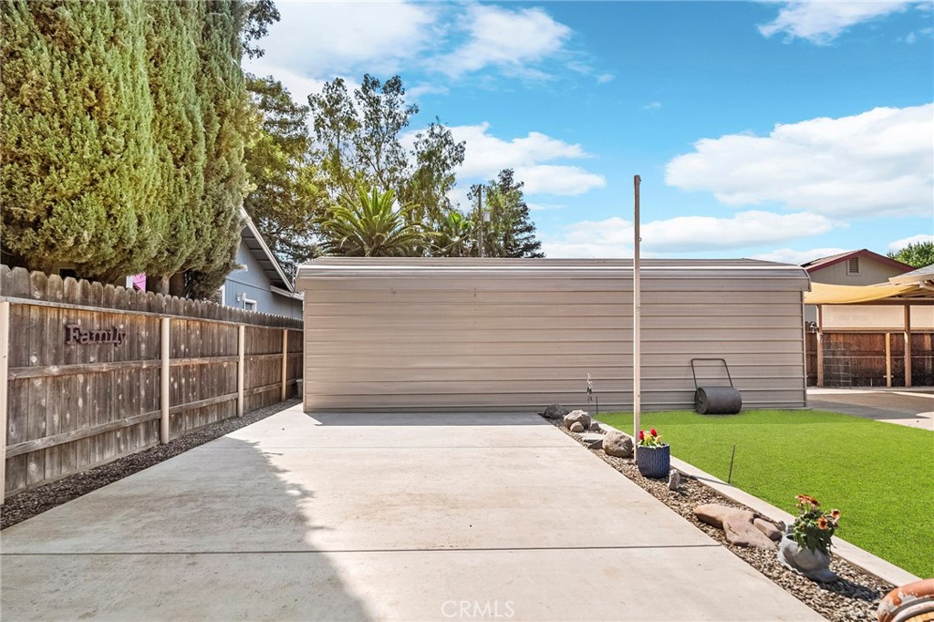 3985 Front Street Chico, CA 95928 - Photo 37 of 55 a view of a backyard with a large tree