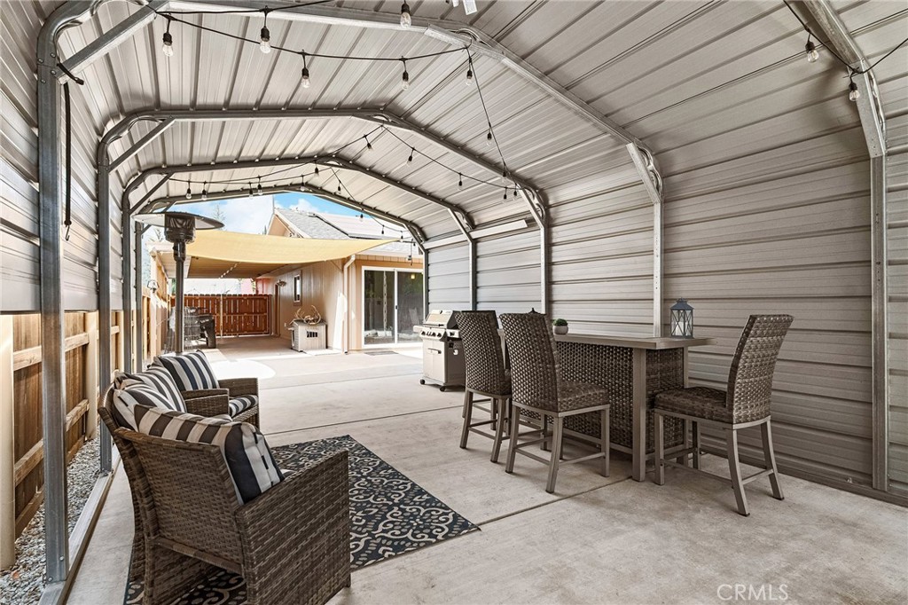 3985 Front Street Chico, CA 95928 - Photo 44 of 55 a view of a patio with a dining table and chairs