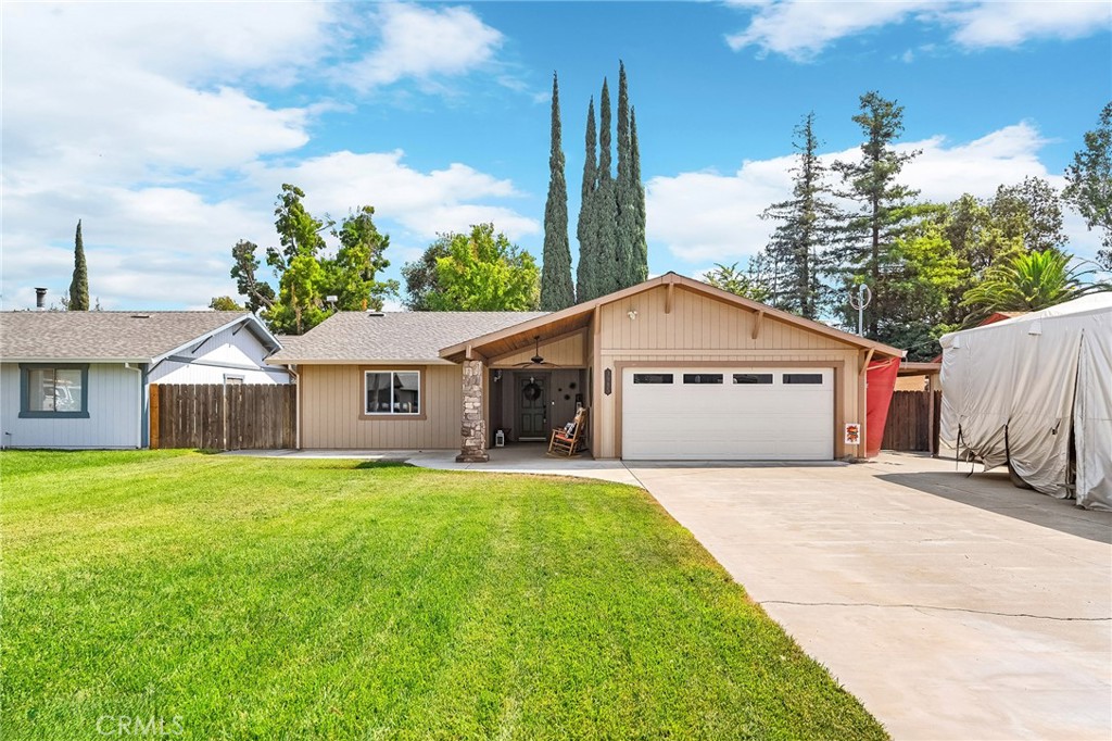 3985 Front Street Chico, CA 95928 - Photo 51 of 55 a front view of house with yard and trees in the background