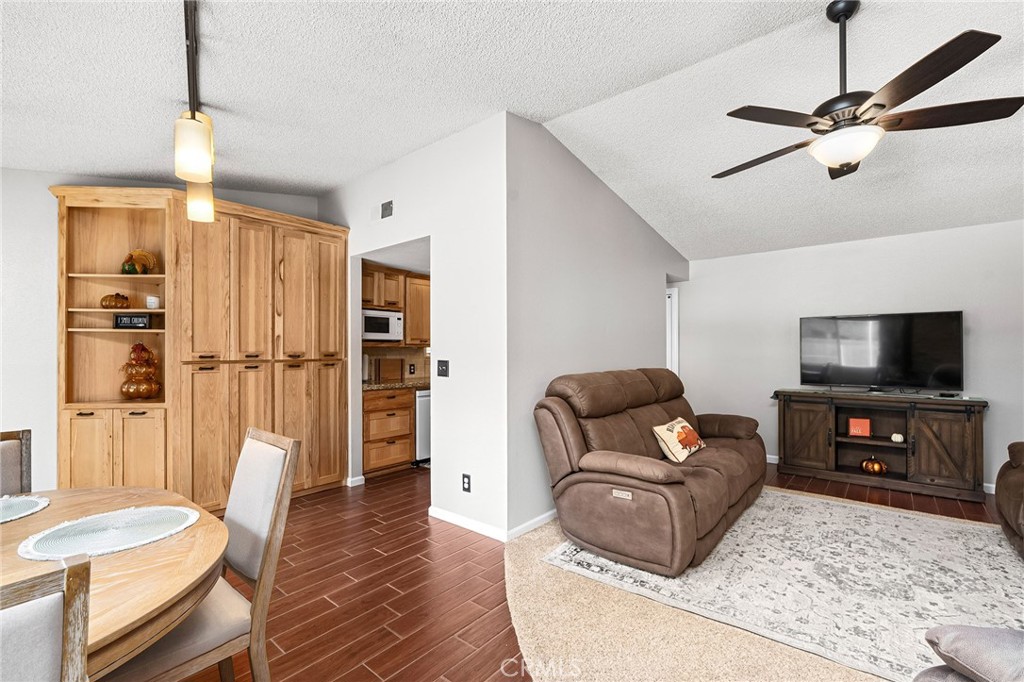 3985 Front Street Chico, CA 95928 - Photo 9 of 55 a living room with furniture and a flat screen tv
