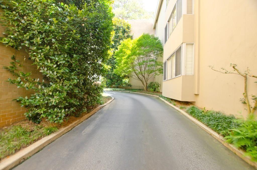 2734 Peachtree Road Northwest, Unit C404 Atlanta, GA 30305 - Photo 17 of 19 a view of a street with a building in the background