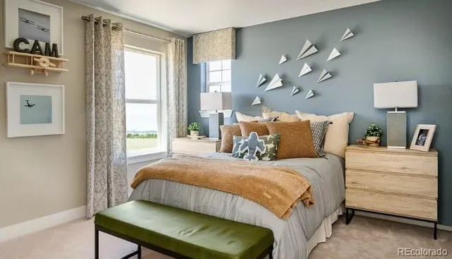 a work room with furniture and a window