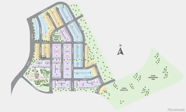 an aerial view of a residential houses with outdoor space