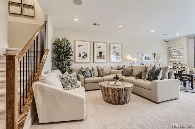 a spacious bedroom with a bed and window