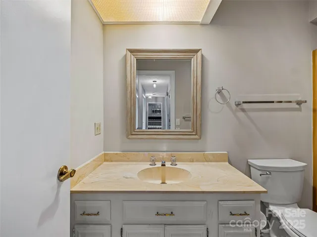a bathroom with a sink and a toilet