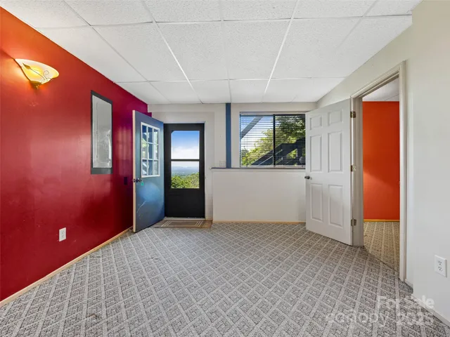 an empty room with windows