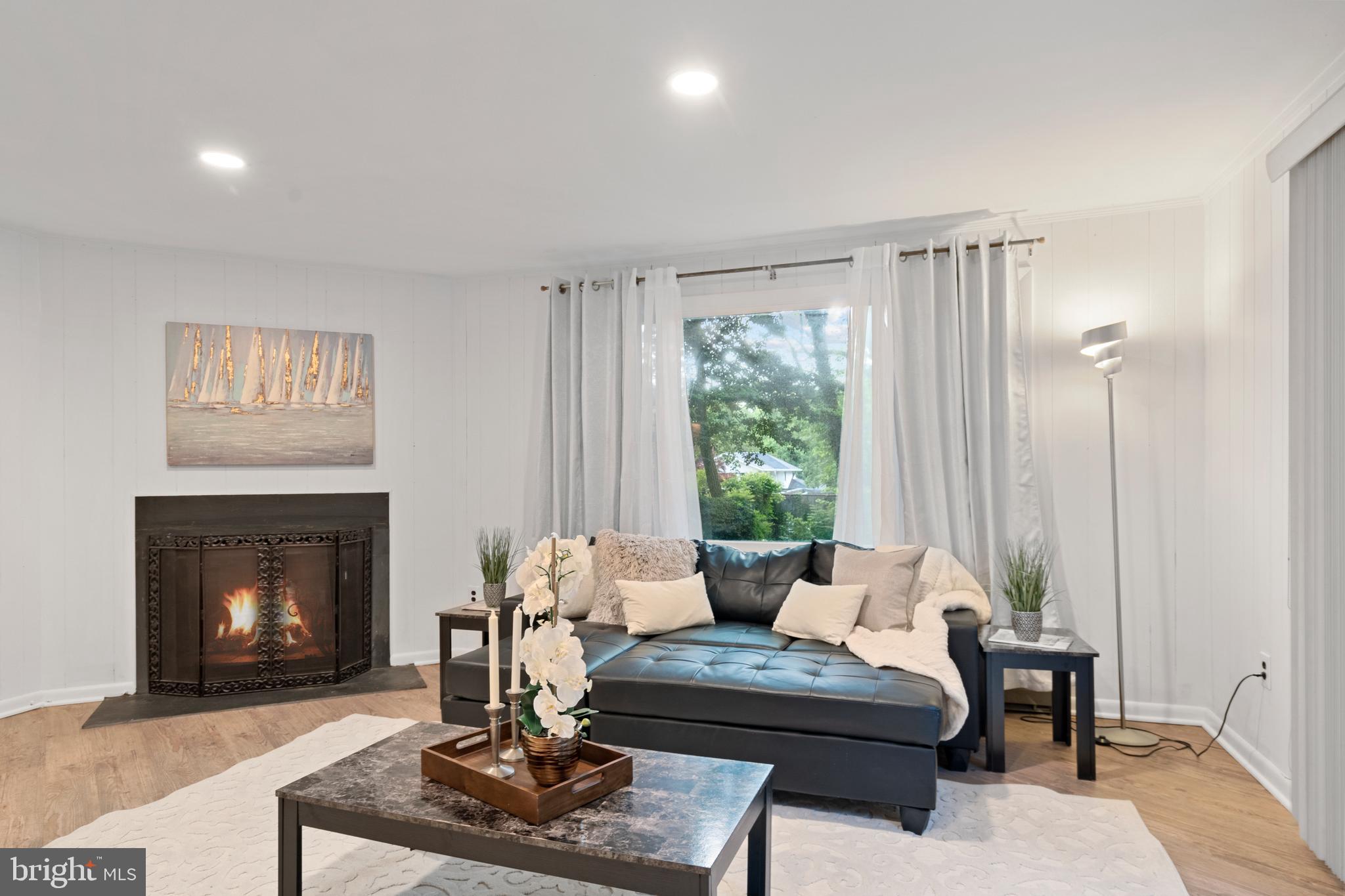 1650 Foxhall Road Northwest Washington, DC 20007 - Photo 27 of 34 Lower Level family room w/fireplace