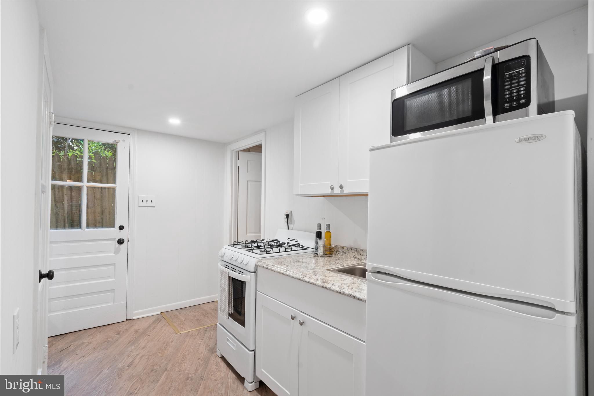 1650 Foxhall Road Northwest Washington, DC 20007 - Photo 32 of 34 Lower Level Kitchen w/walk out