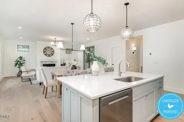a very nice looking dining room with a table and chairs